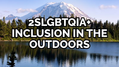 Text "2SLGBTQIA+ inclusion in the outdoors" over Mt. Rainer and lake