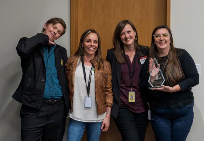 Finn Shinnick, Heather Bates, Elizabeth Kingsbury, and Stella Spracklin (Office of the Corrections Ombuds) accepting RAIN Outstanding Agency Award
