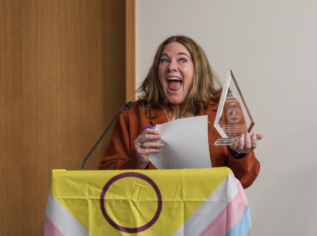 Cami Feek, ESD Commissioner, accepting RAIN Outstanding Agency Award